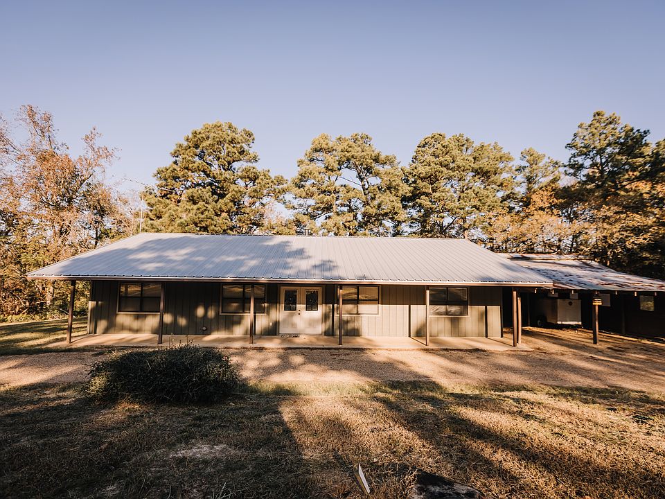 Front Exterior with Car Port that can actually be closed in.