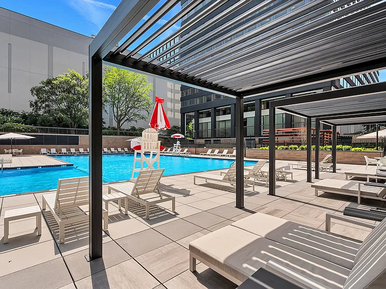 Pool & Sundeck with Outdoor Seating and Lounge Chairs