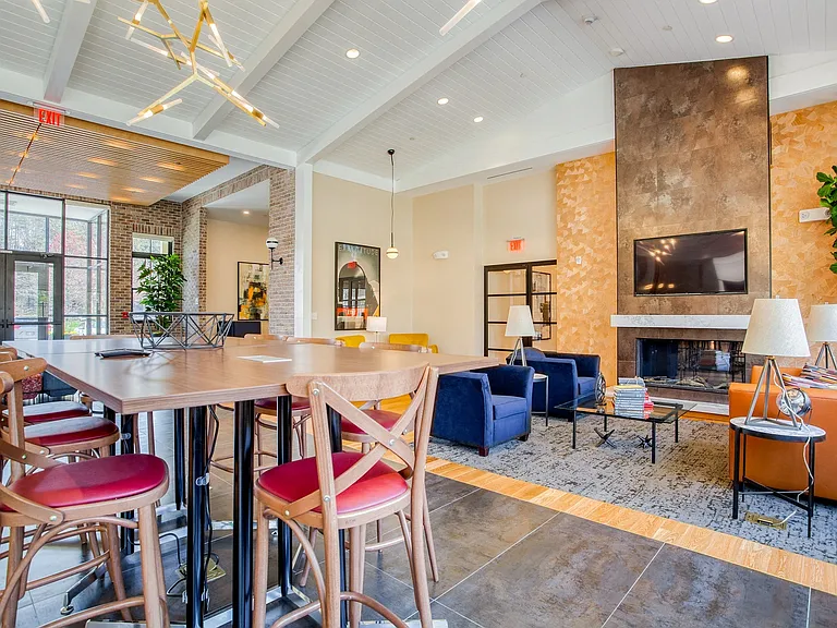 Unwind next to the fireplace with a good book and a comfy lounge chair