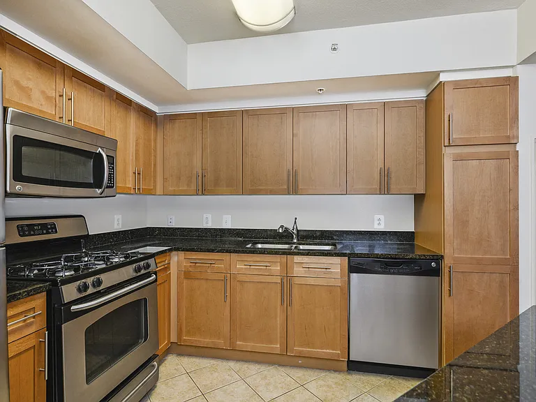 Modern Kitchen with Dishwasher, Disposal, Pantries, and Microwaves