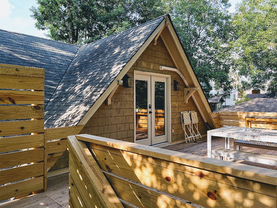 Double doors open to massive private deck
