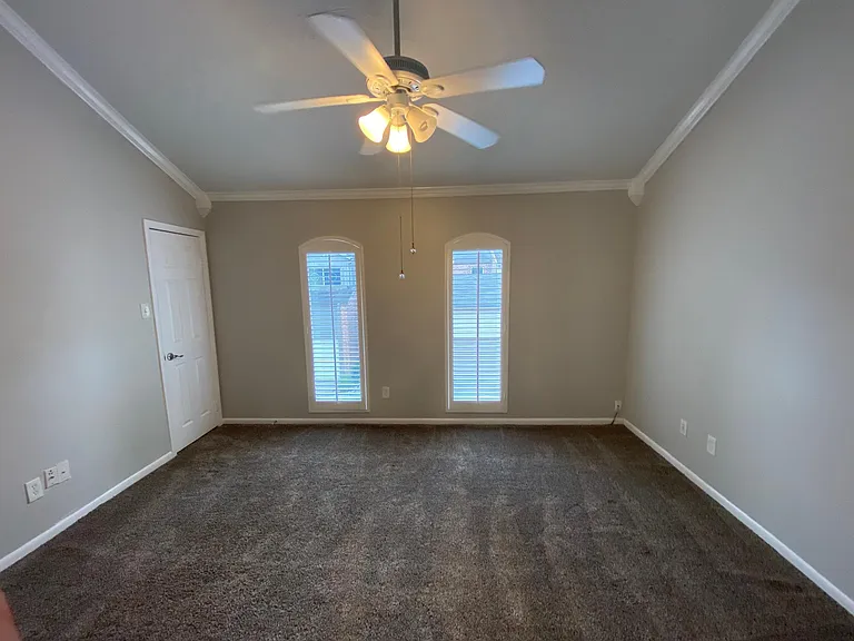 Guest Bedroom boasts a vaulted ceiling, walk in closet and king size ready.