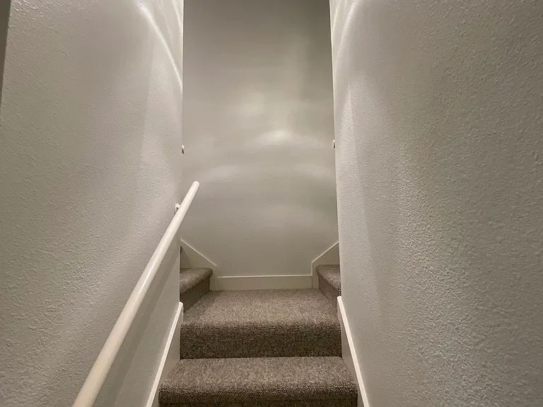 Stairway to bedrooms