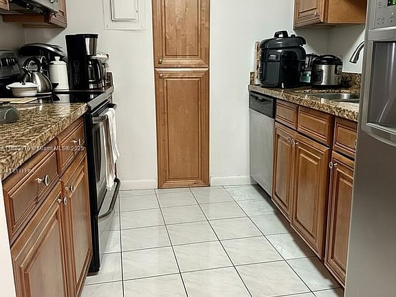 5th image of 900 Bay Dr APT 211