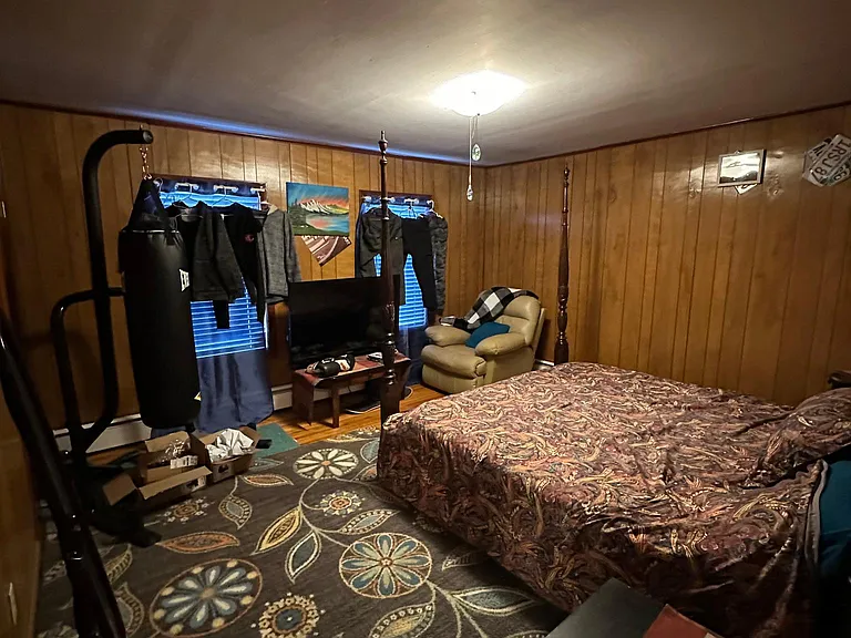 View of the front non-conforming bedroom or 2nd living room - your choice. Furnishings not included.