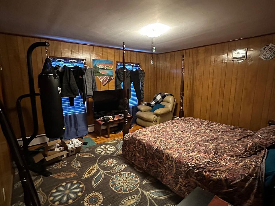 View of the front non-conforming bedroom or 2nd living room - your choice. Furnishings not included.