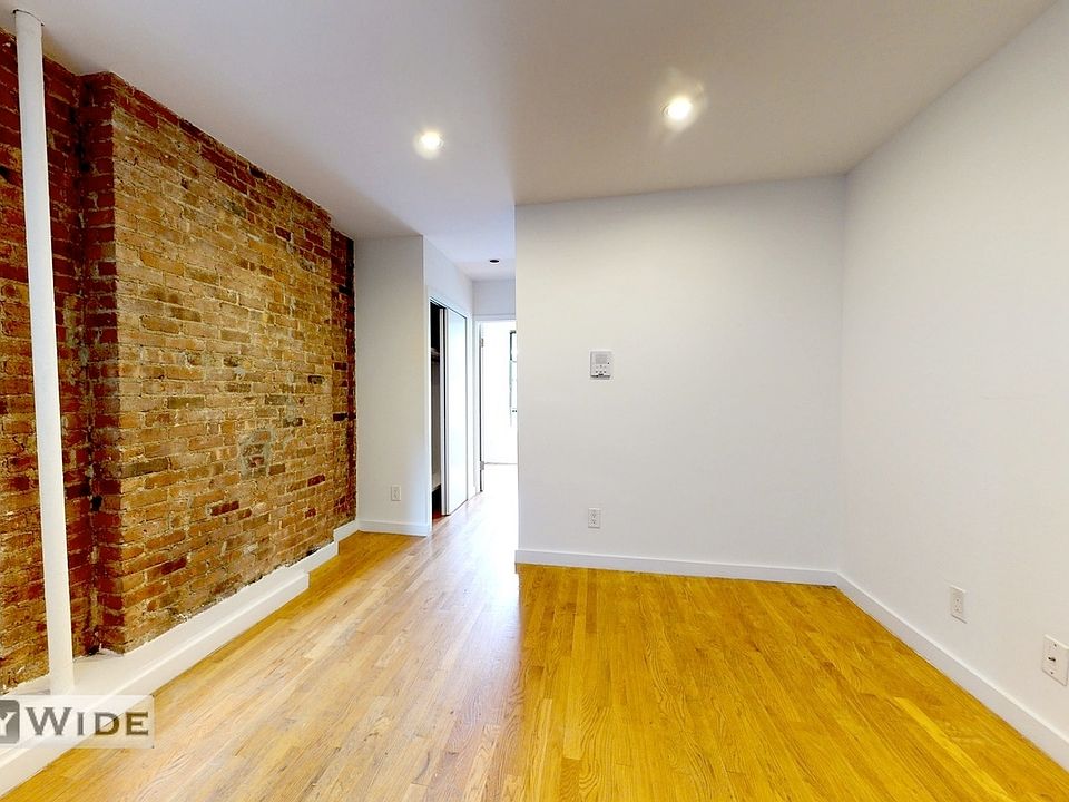 1st image of 407 W 50th St APT 13