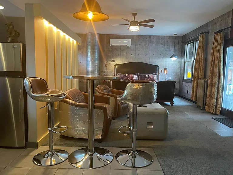 Steampunk Suite Riveted Bar & Stools with Overhead Lighting and blackout curtains