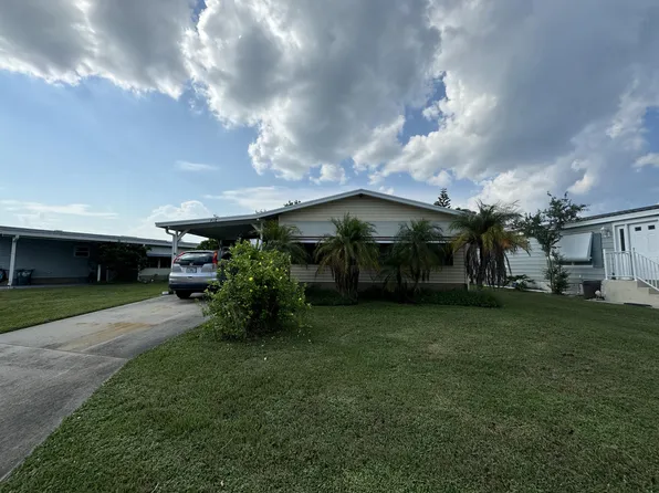 918 Jacaranda Dr, Barefoot Bay, FL 32976