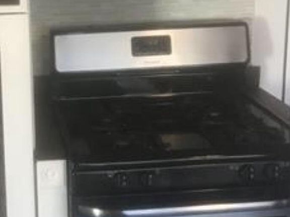Stainless appliances/ kitchen has dining area