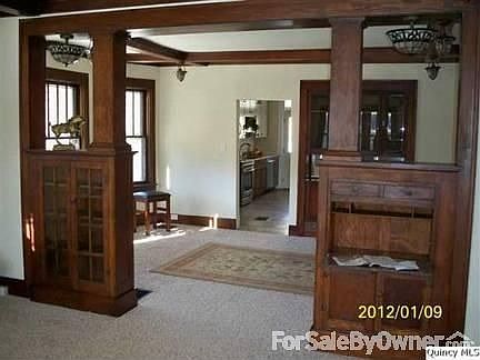 Downstairs living room looking dining room, all original woodwork!!!!