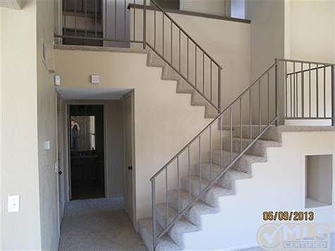 Stairs next to living room