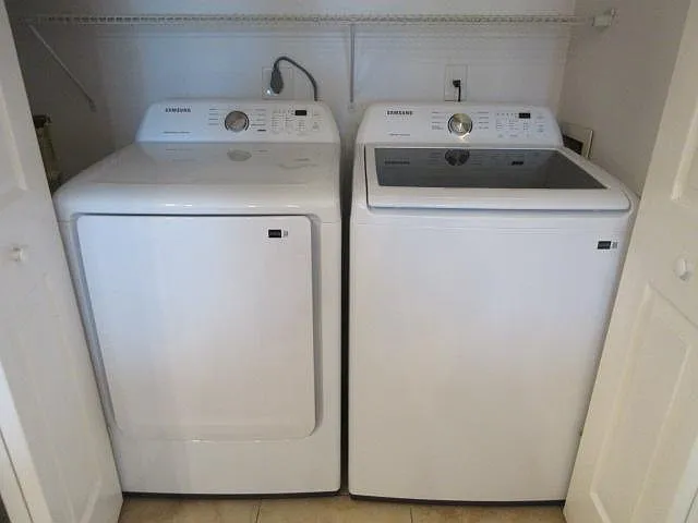 Full size washer & dryer inside kitchen closet