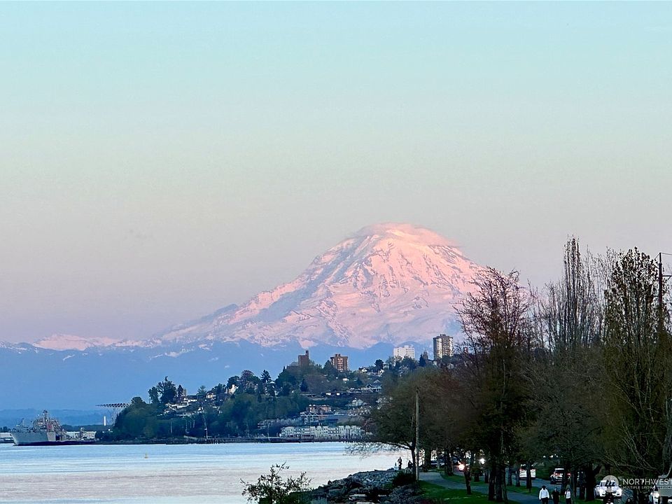 East facing views of Mt. Rainier, Cascades, Puget Sound and City Lights at Night>