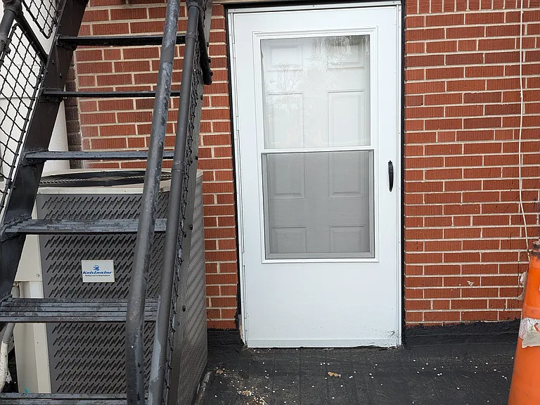 1 of two back entrances that lead to off street parking.
