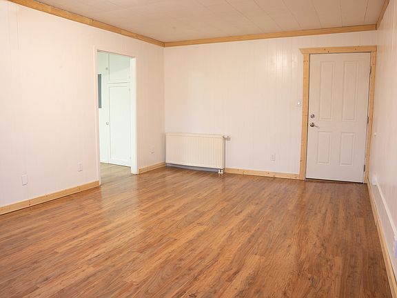 Living room facing entrance to apartment