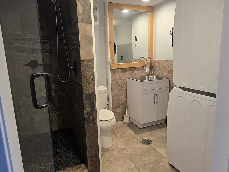 Downstairs bath and laundry