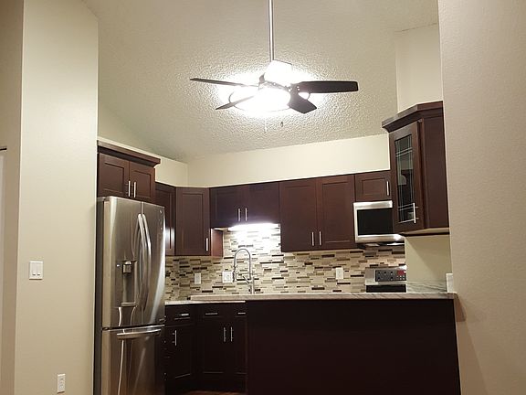 Vaulted ceiling with skylight.