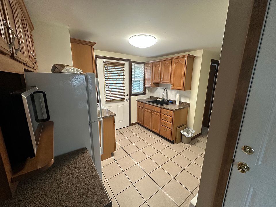 Front Door with Sink, Fridge & Stove