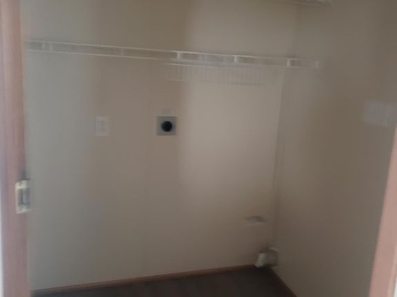 Laundry room off of the kitchen. Back door is of laundry room.