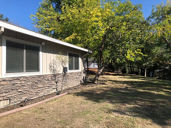 Front of house to right of front door