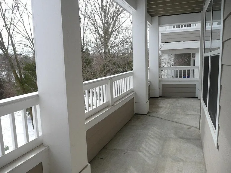 Large balcony overlooking the trees