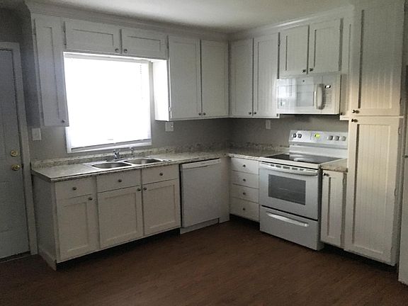 New Kitchen cabinets, New countertop, New dishwasher stove and microwave