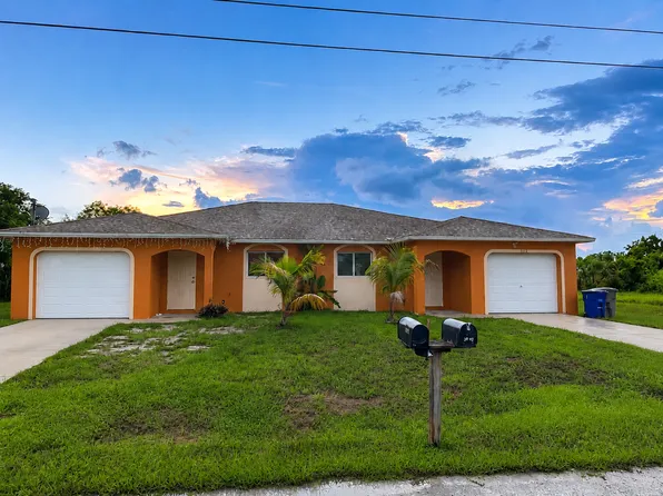 1128 Gilbert Ave S, Lehigh Acres, FL 33973
