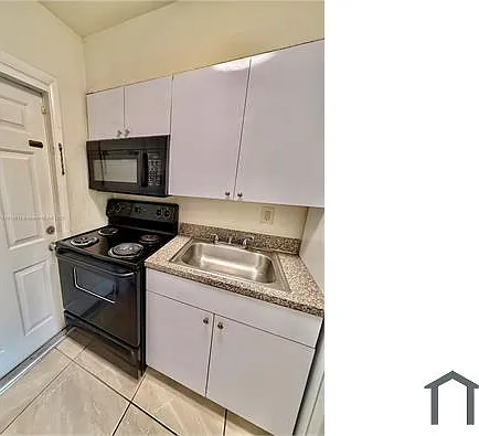 2571 NW 13th Ct — Photo 5