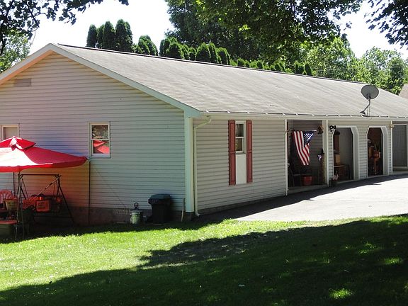 Back yard and driveway / parking area