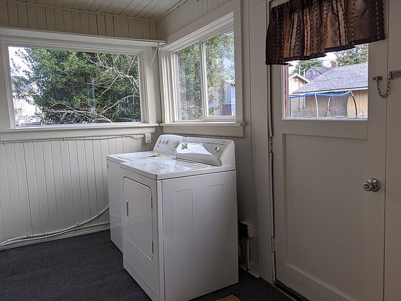 Laundry room and door to backyard.
