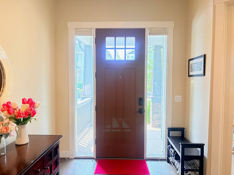Bright entryway with top-down bottom-up shades for maximum light and privacy.