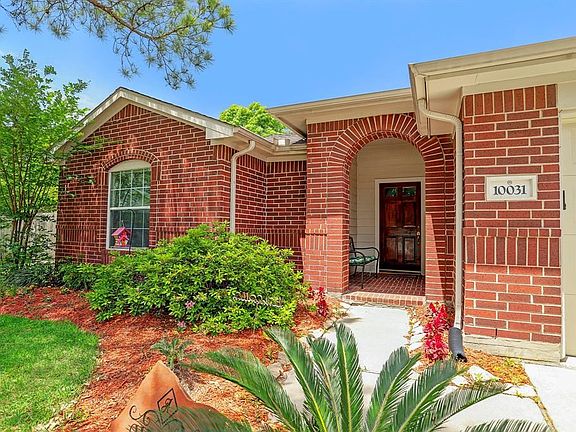 Curb Appeal Is Great On This Home With Porch Over Front Door.