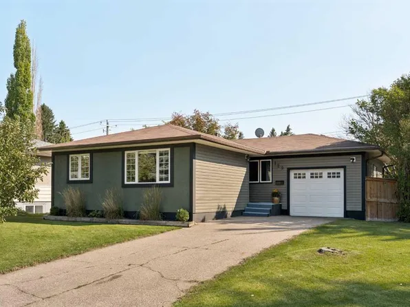 129 N Springwood Dr SW, Calgary, AB T2W 0K8