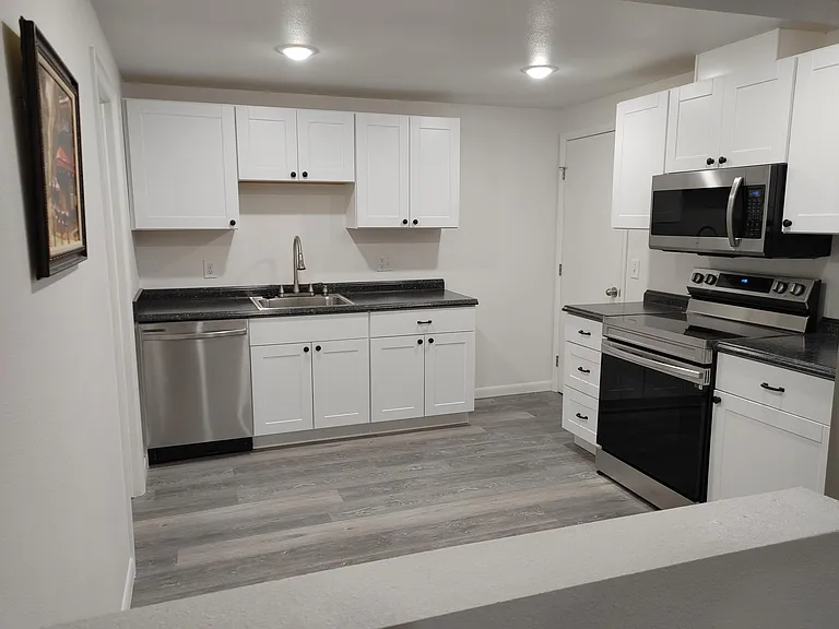 Newly remodeled kitchen - laundry room and large pantry adjacent to room