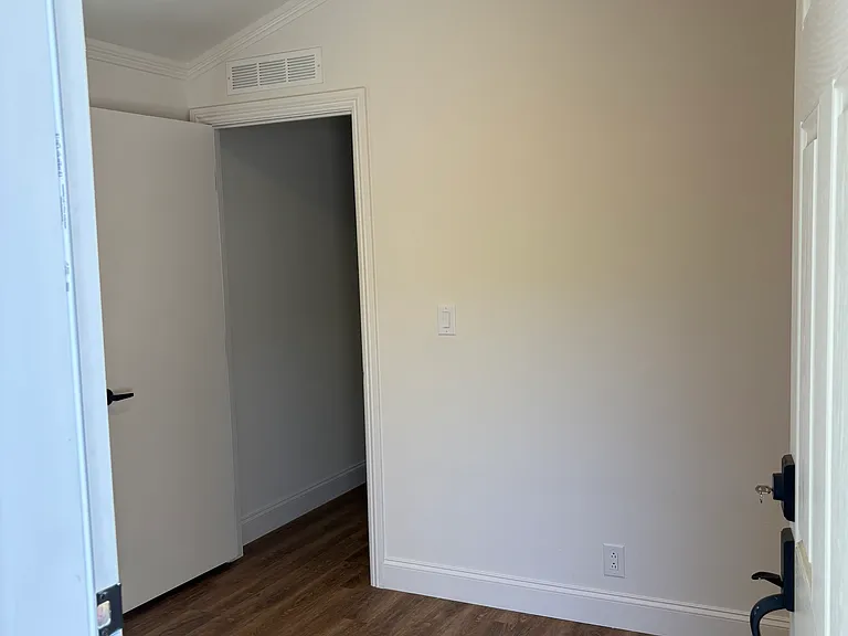 Bedroom #1 as viewed from the side porch