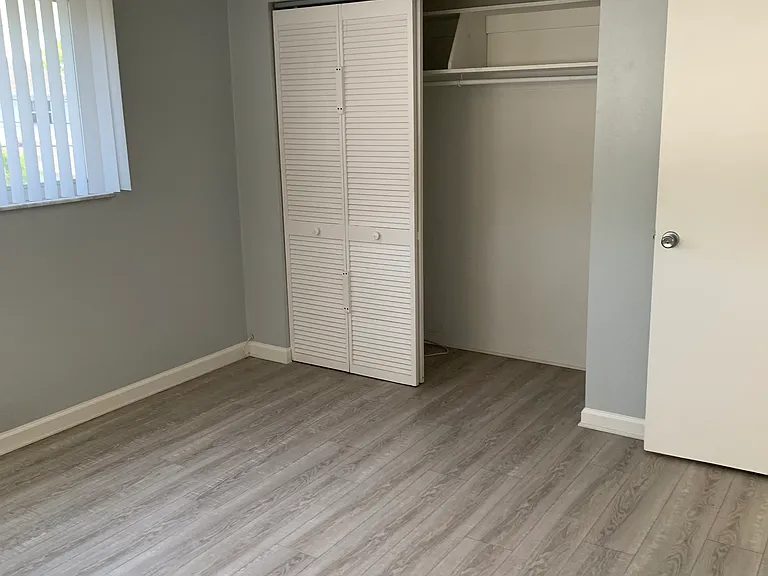 Bedroom 2 closet with sliding doors