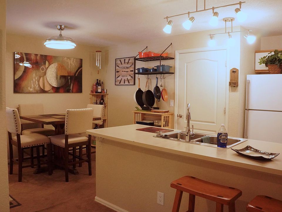 Dining and Kitchen, Door next to fridge opens to washer and dryer