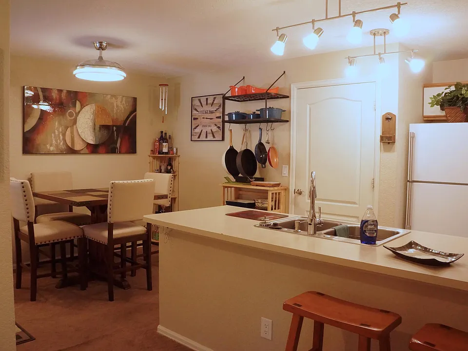 Dining and Kitchen, Door next to fridge opens to washer and dryer