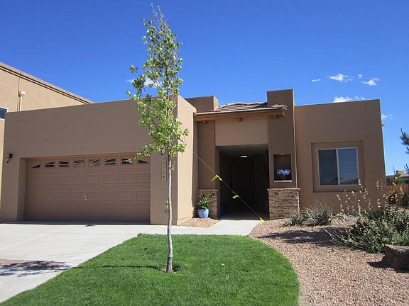 Corner lot is beautifully landscaped.