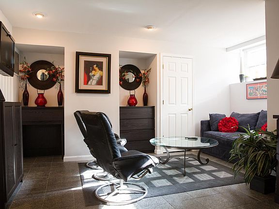 Living room area with VERY comfortable leather reclining cha