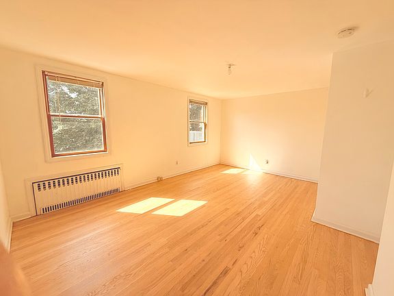 First of 2 bedrooms. This bedroom is larger of the two.