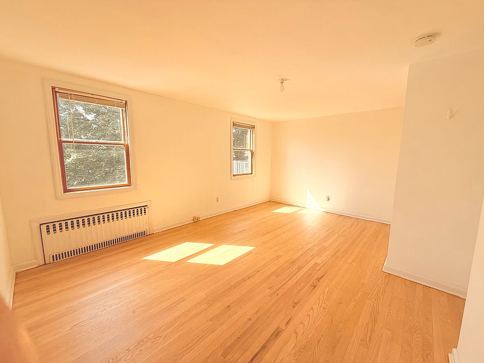 First of 2 bedrooms. This bedroom is larger of the two.