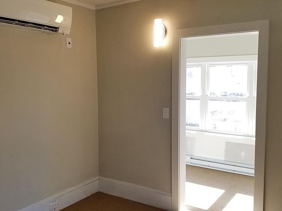Bedroom leading to sunroom