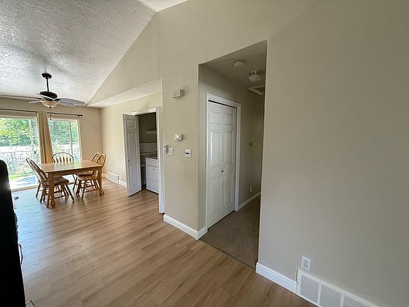 Hallway to the right of the entryway that leads to the 3 beds and 2 bath