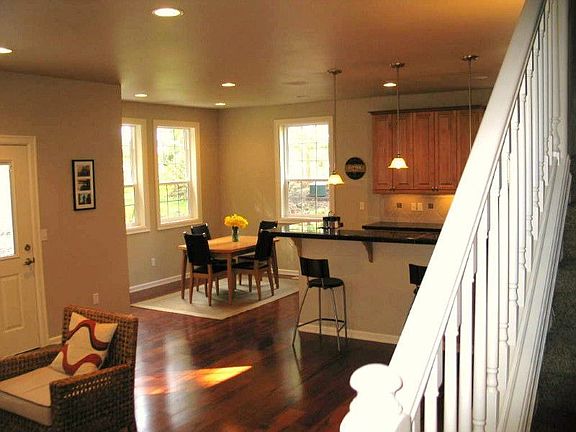Open & Flowing Floor Plan with Hardwood (Brazilian Cherry), Slate & Tile Flooring Throughout.