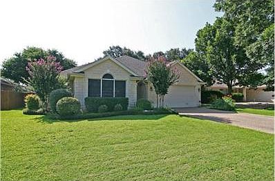 Lush Landscaping, Inviting Entrance