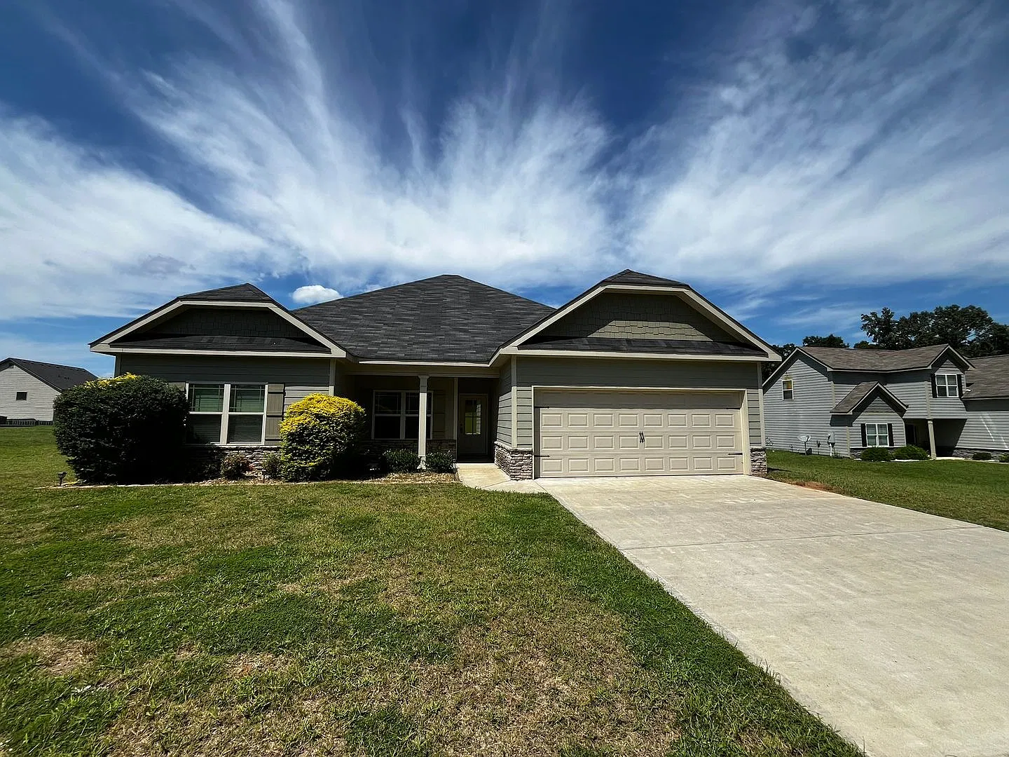 Love Where You Live! Spacious Home with Double Garage & Everyday Comfort! — Photo 1