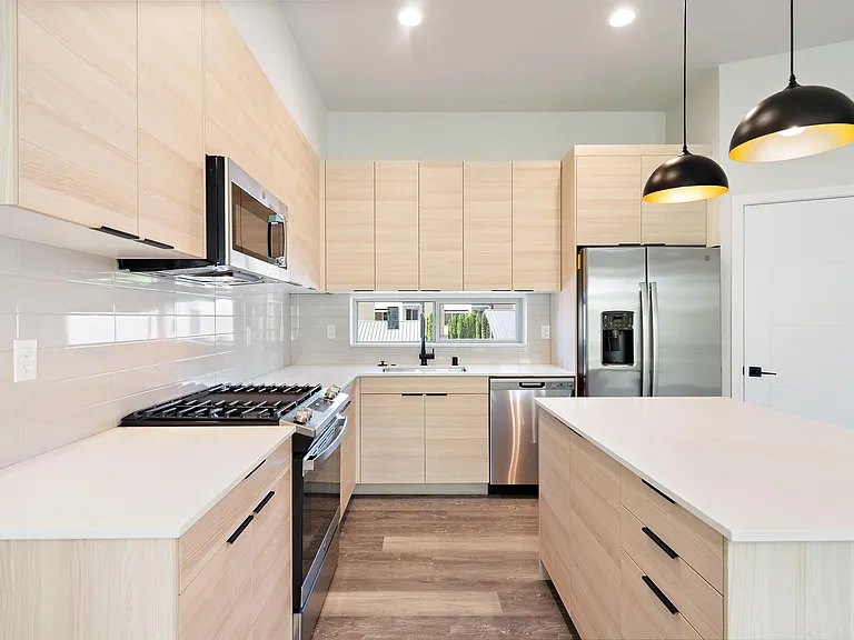 Soaring 11' high ceilings + spacious kitchen