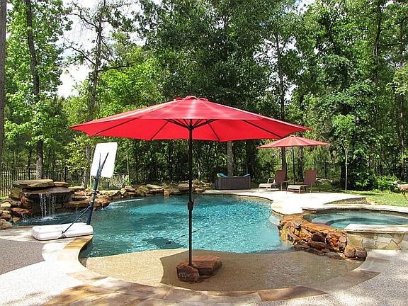 Heated Salt Water pool up to 7 1/2' deep. Pebble Tech bottom, sun shelf, rock waterfall, flagstone c